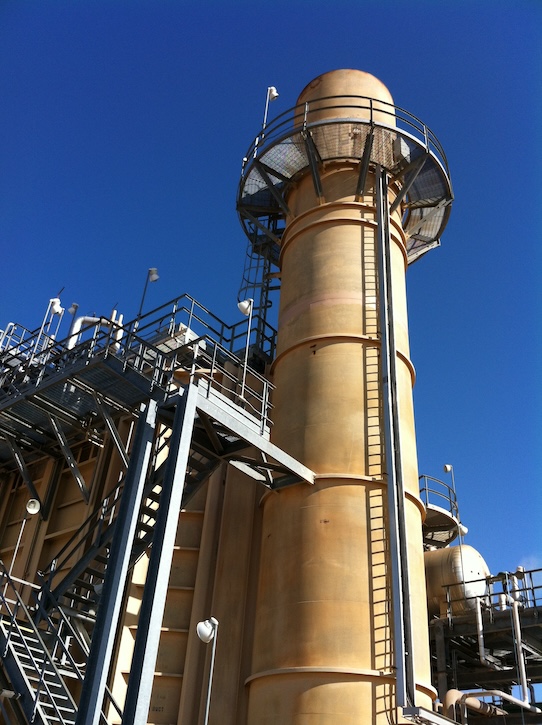 Combined cycle power plant supplying steam for oil recovery.